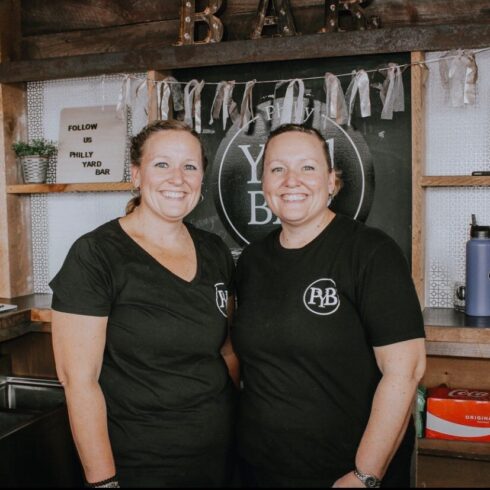 Owners of Philly Yard bar behind the bar