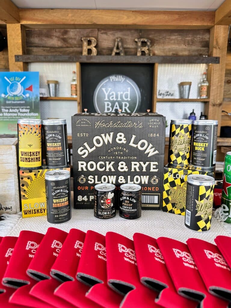 IMG_0750 Philly Yard bar's display of slow and low rock and rye, koozies, whiskey sunshine- golf outing goodies