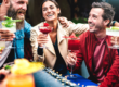 Group of Adults enjoying cocktails outside
